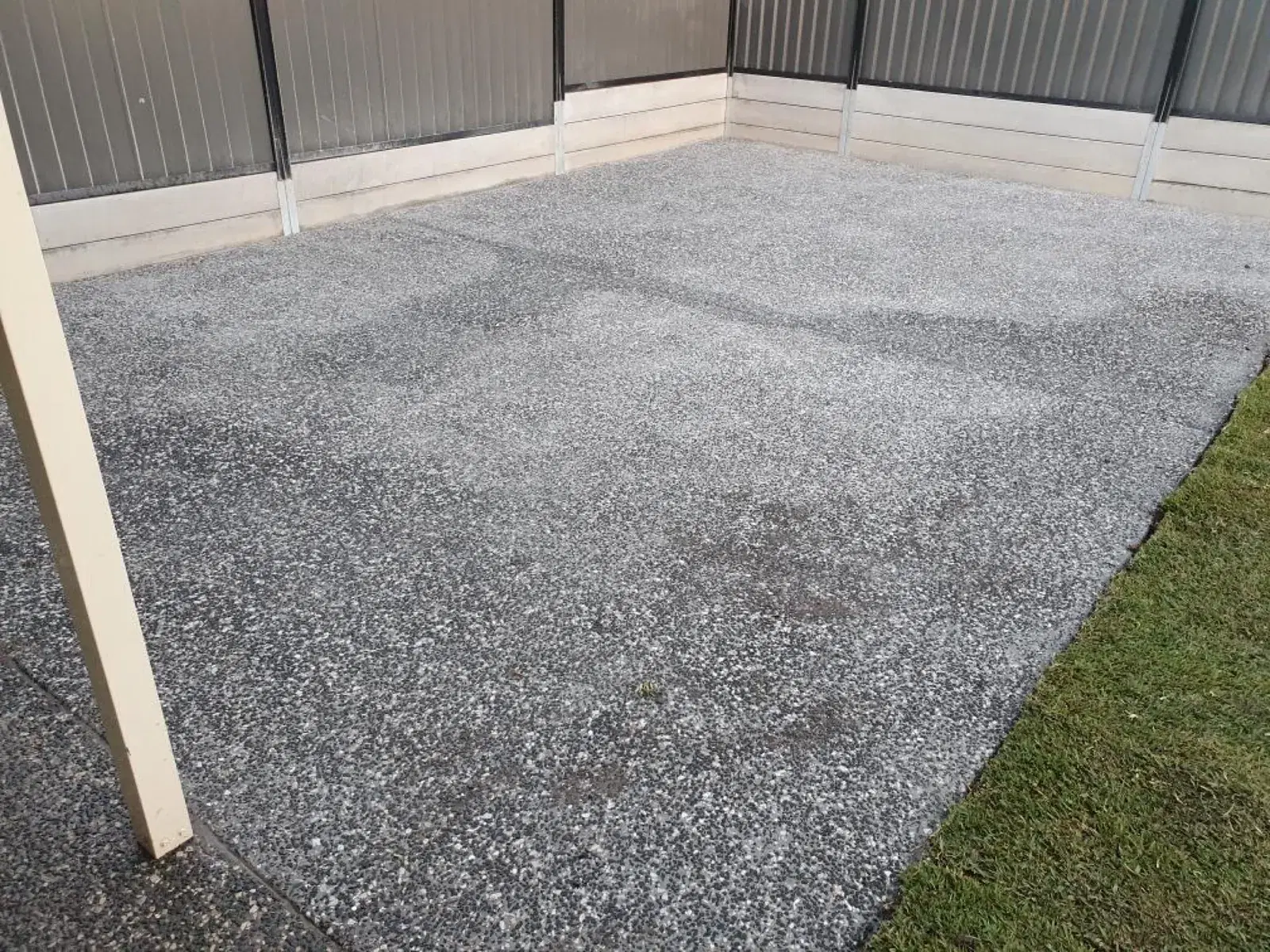 Exposed aggregate concrete outdoor entertaining area for a Brisbane backyard