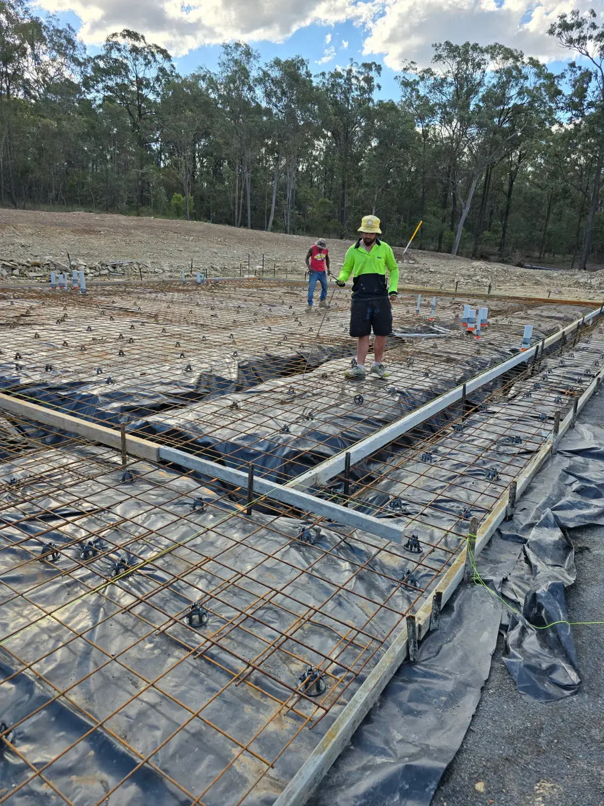 Reinforced concrete slab formwork and steel reinforcement prepared before pouring in Brisbane