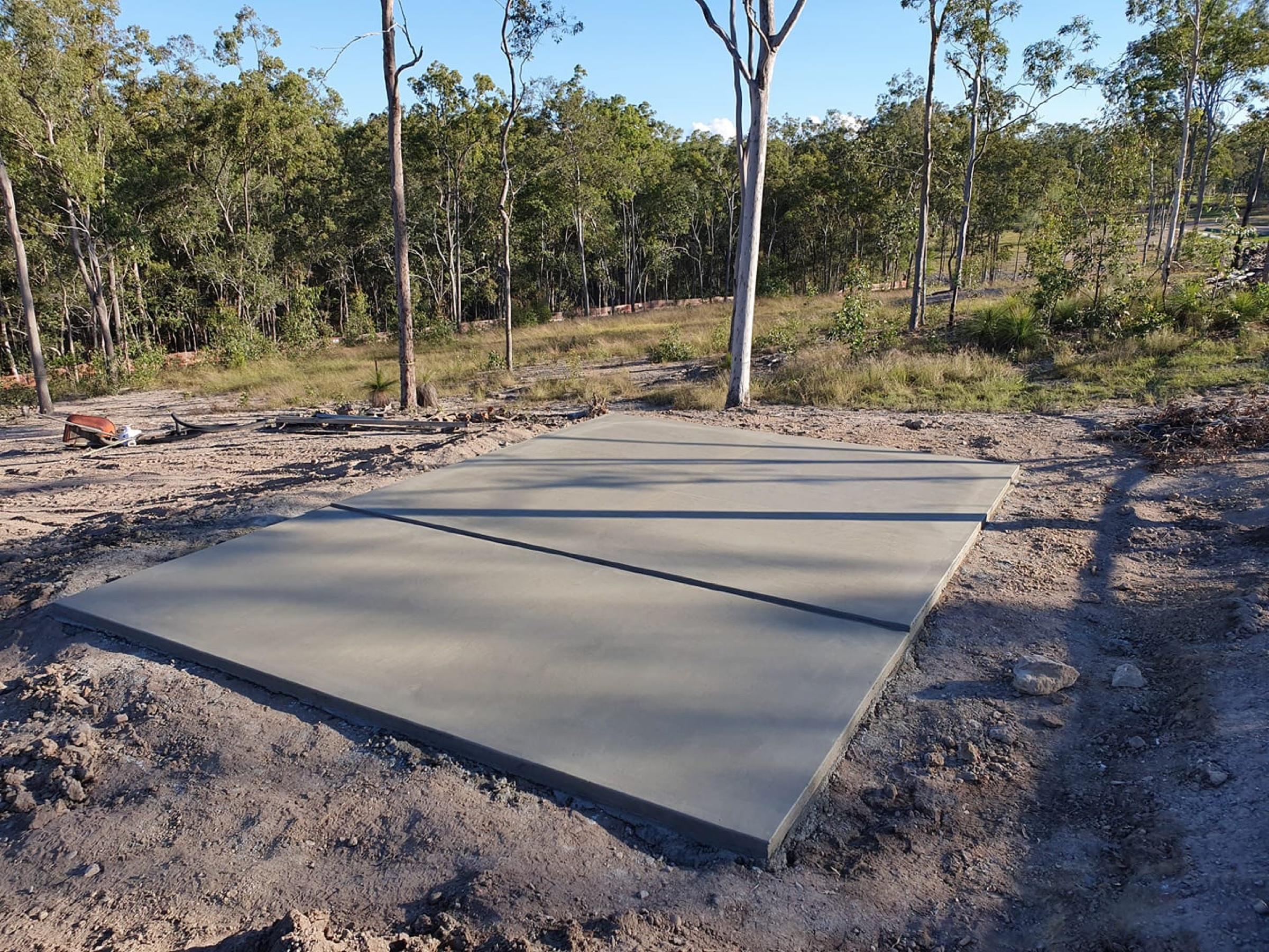 Large finished concrete shed slab on a rural block